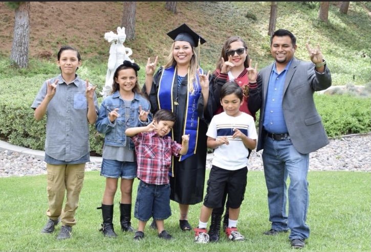 Cassandra Saucedo with her family when she graduated with her bachelor's degree in 2018.